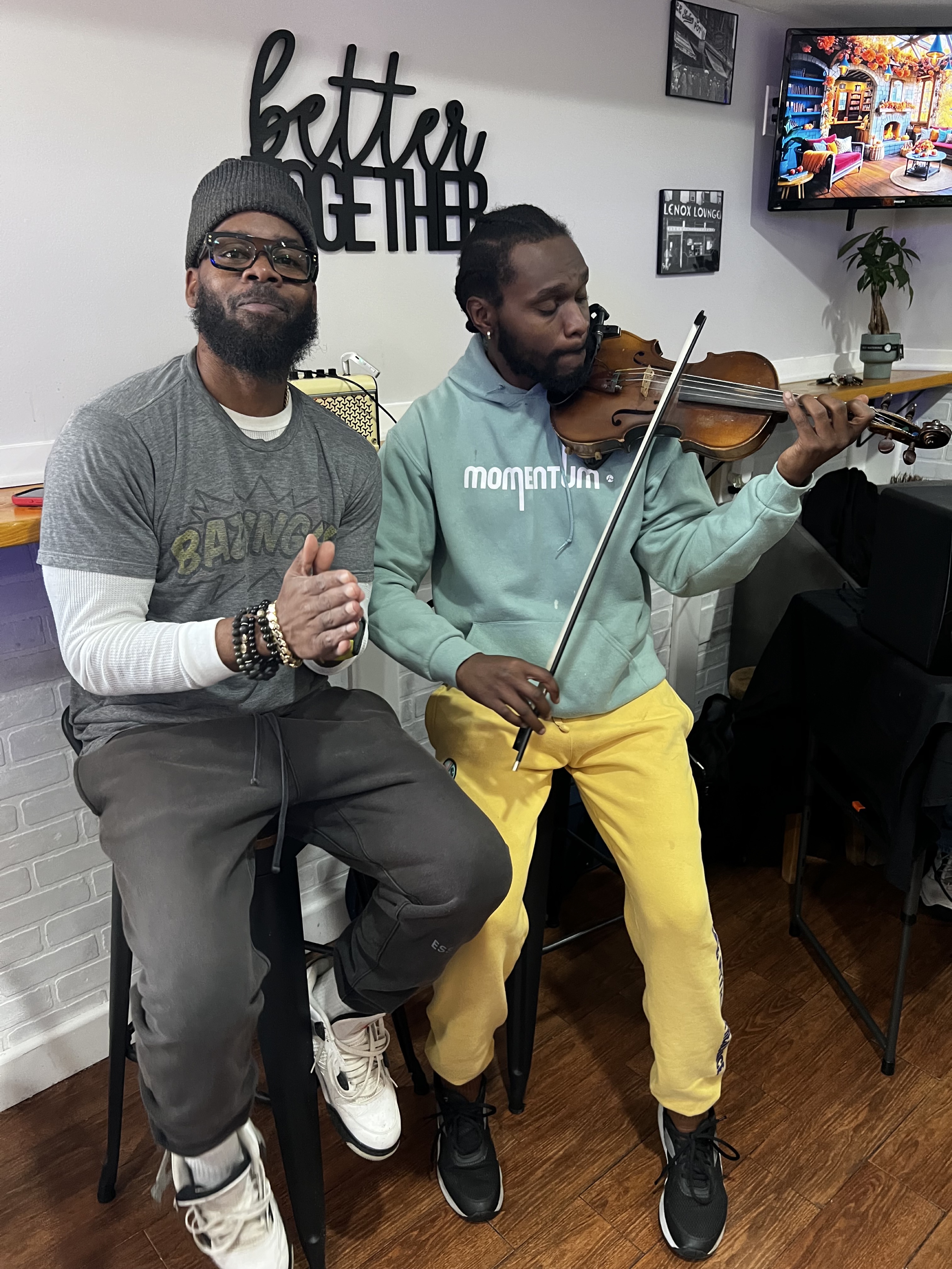 Guests smiling together at Cafe By Us